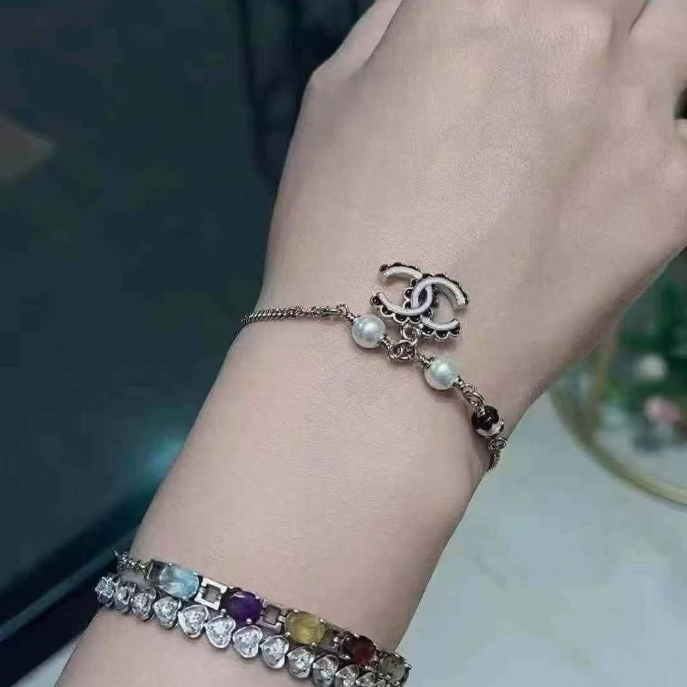 CHANEL Gold Bracelet with Pearl and Black Accents - Picture 4 of 10